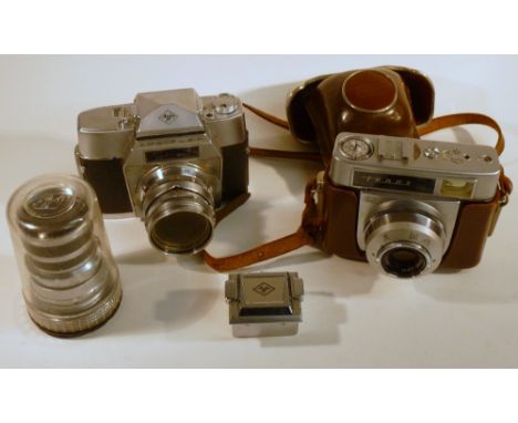 ZEISS IKON WITH A TESSAR 2.8/50 LENS IN A LEATHER CASE AND AN AGFA AMBIFLEX CAMERA WITH A SOLINAR 1:2.8/50 LENS, WITH A LIGHT