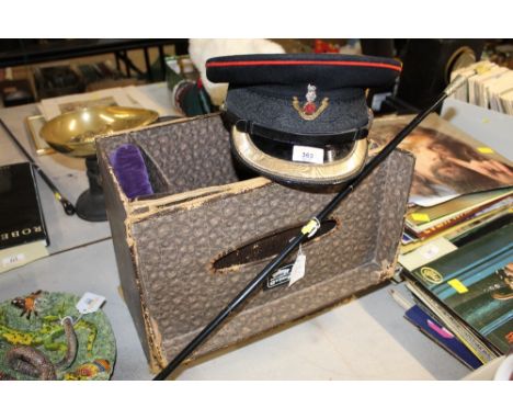 A Royal Regiment cap and bag with swagger stick