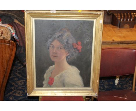 Early 20th century oil on canvas, portrait of young girl within a gilt slip and moulded frame, canvas marked as Winsor &amp; 