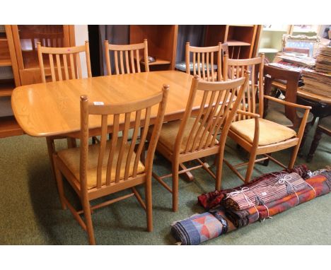 Ercol blonde elm Dining table and a Set of 6 matching dining chairs 