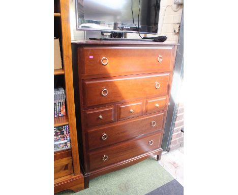 Stag Chest of 7 Drawers with metal drop handles on bracket feet 