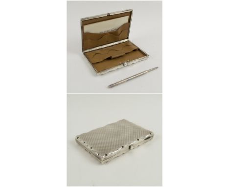SILVER CARD CASE, Edwardian of shaped rectangular form with engine engraved decoration and fitted leather interior, hallmarke
