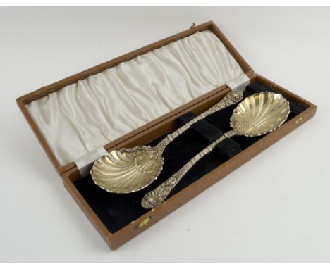 SILVER SERVING SPOONS, a pair, the shell design bowls with traces of gilt, London 1919, makers Wakely & Wheeler, total weight