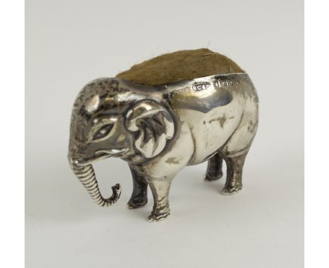 SILVER ELEPHANT PIN CUSHION, Edwardian Birmingham 1905, makers Britton, Gould & Co, 6.5cm L x 5cm H.
