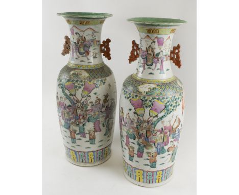 CHINESE VASES, a matched pair, Oriental ceramic decorated ceremonial figures in a landscape, famille rose palette, 59cm H x 5