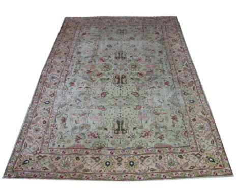 VINTAGE SIGNED TABRIZ CARPET, 315cm x 225cm, allover design of palmettes, botehs and vines on a jade field inside correspondi