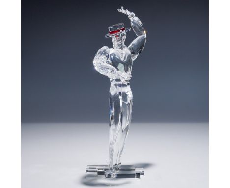This Swarovski crystal figurine, titled Antonio, is part of the renowned Magic of Dance collection. Designed with remarkable 