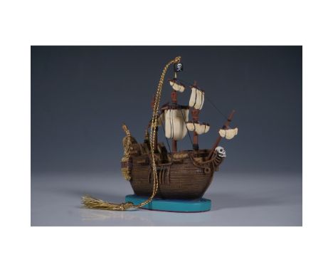 A finely detailed Disney Enchanted Places ornament featuring the Jolly Roger, the infamous pirate ship from Walt Disney’s Pet