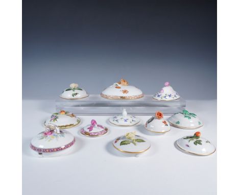 A collection of eleven hand painted porcelain lidded dish tops, attributed to Herend (unmarked, but recognizable by patterns 