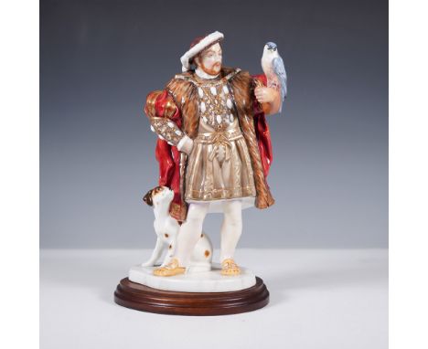 Hand-crafted and hand-decorated by Royal Doulton, this porcelain figurine represents King Henry VIII in full Tudor regalia.  