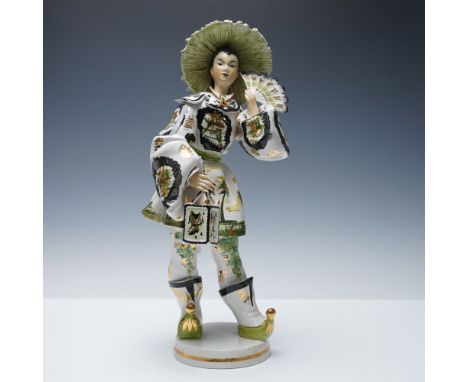 This striking Italian porcelain figurine captures the essence of Eastern aesthetics through a Western lens. It is meticulousl