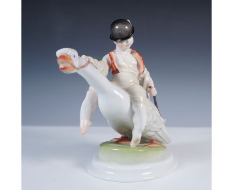 Hand-painted Herend figurine depicting a young boy riding a goose, crafted in Hungary with fine attention to detail and soft 