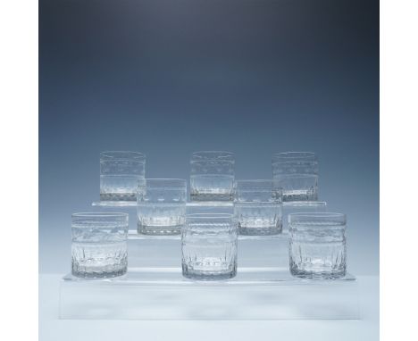 A set of eight finely crafted cut glass double old-fashioned tumblers featuring a distinctive raised bubble band around the u