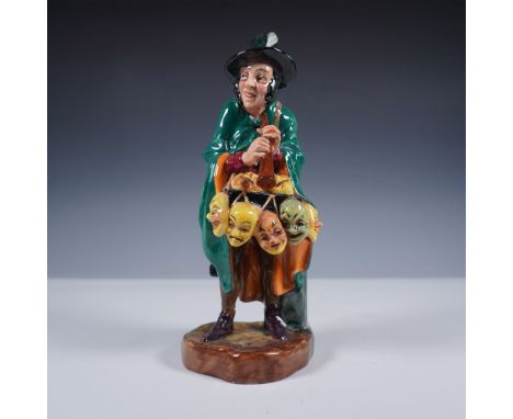 Colorful Royal Doulton porcelain figurine titled The Mask Seller, model HN2103. Designed by Leslie Harradine and issued in 19