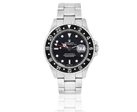 Rolex. A stainless steel automatic calendar bracelet watch with dual time zoneModel: GMT Master IIReference: 16710Date: Purch