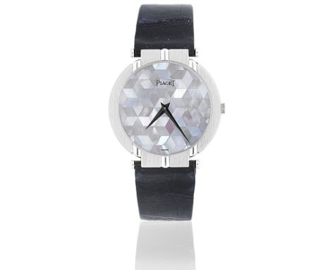 Piaget. An 18K white gold quartz wristwatch with mother of pearl dialModel: PoloReference: 8673Date: Circa 1990Movement: 10-j