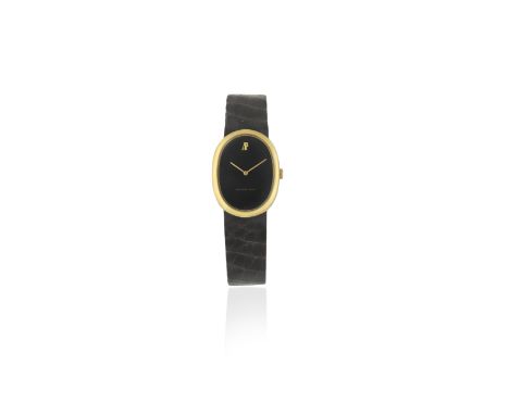 Audemars Piguet. A lady's 18K gold manual wind oval wristwatchReference: B4054Date: Circa 1975Movement: 22-jewel Cal.2052 man