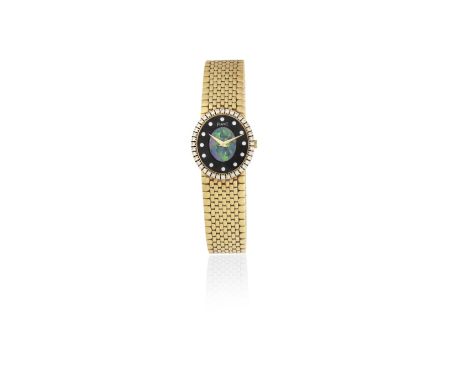 Piaget. A lady's 18K gold and diamond set manual wind bracelet watch with opal dialReference: 9826C 111Date: Circa 1980Moveme
