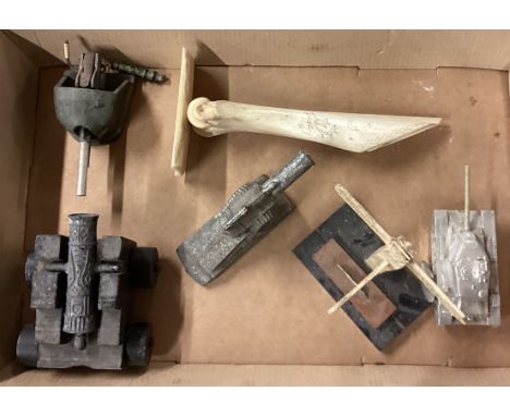 A box containing model cannons etc. Est. £20 - £30.