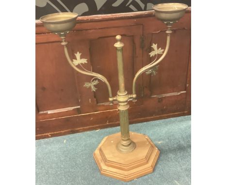 A vintage brass light fitting. Est. £30 - £50.