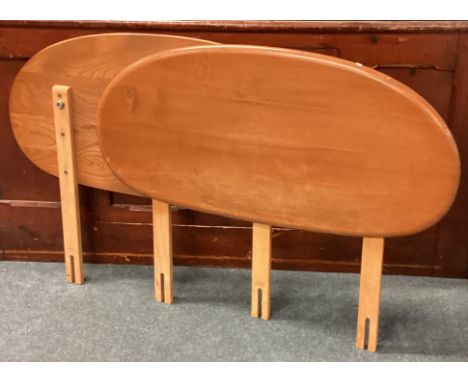ERCOL: Two single headboards. Est. £30 - £40.