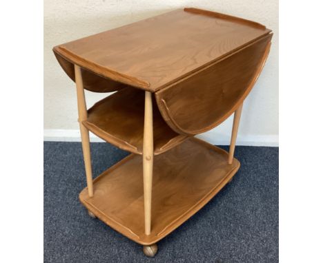 ERCOL: A full flap tea trolley. Est. £50 - £80.