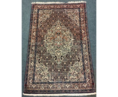 An old tapestry rug. Est. £20 - £30.