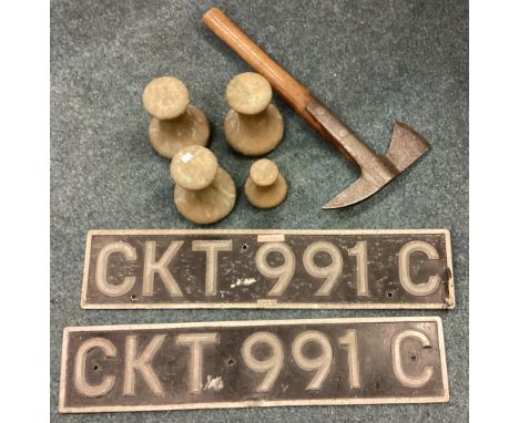 A collection of brass weights, fire axe etc. Est. £10 - £20.