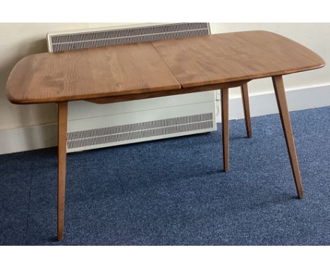 ERCOL: A draw leaf table on four spreading supports. Est. £50 - £80.