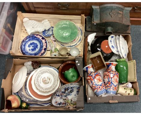 Three boxes of pottery together with a cast iron hopper etc. Est. £20 - £30.