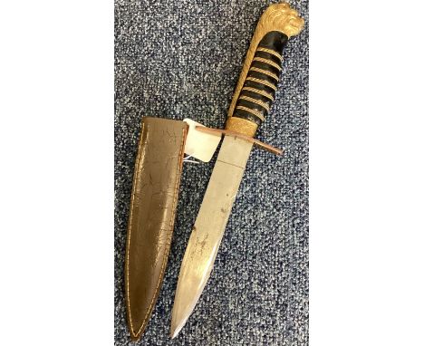 An Italian Army Officer's dagger in scabbard. Est. £20 - £30.