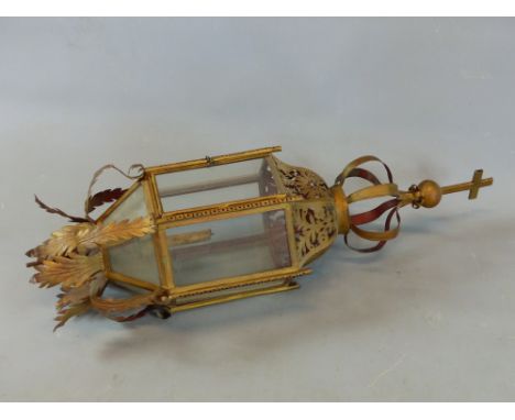 A 19TH.C. ECCLESTIASTIC TINWARE POLE CANDLE LANTERN WITH FOLIATE PIERCED DECORATION.