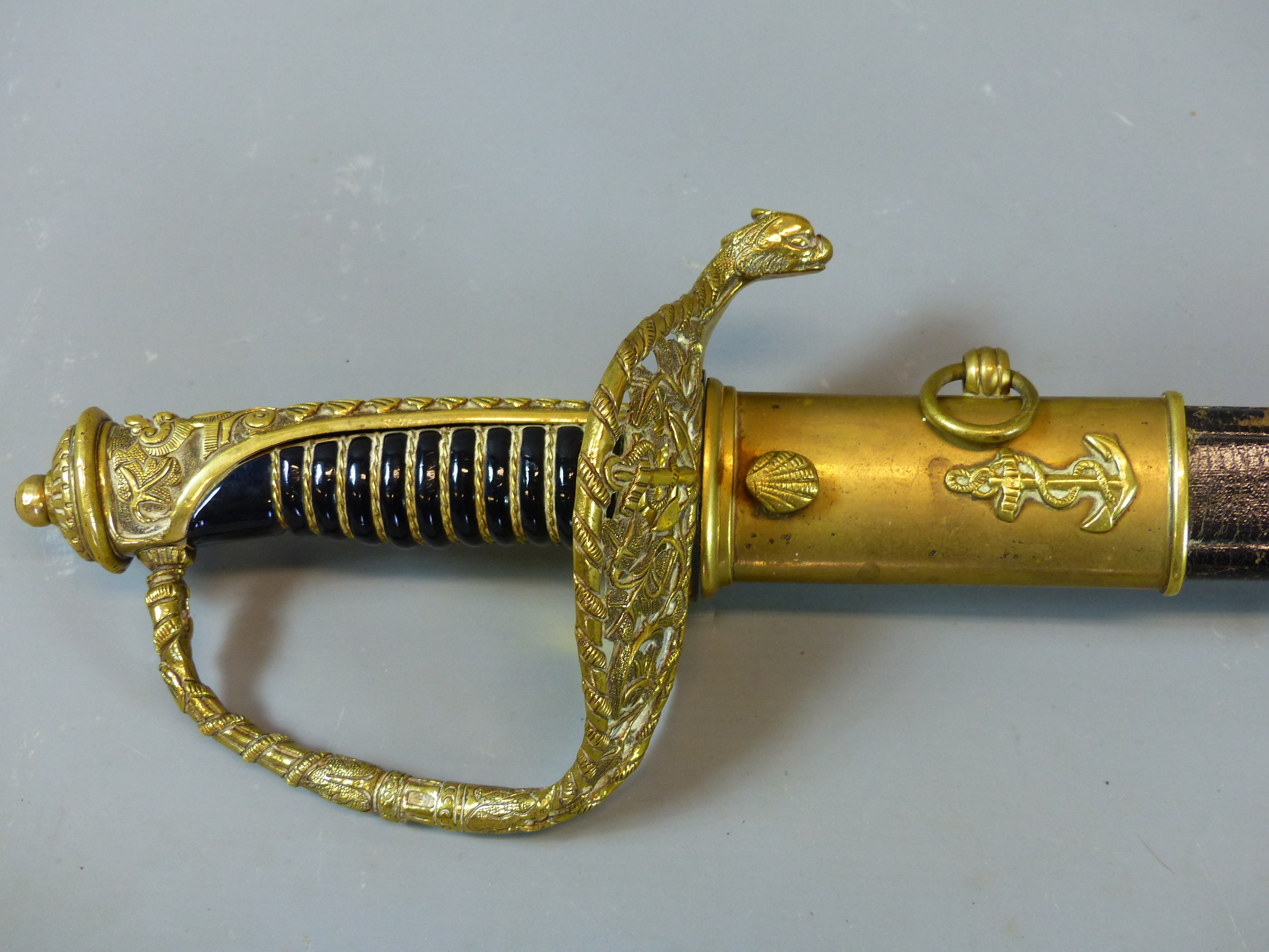 A FRENCH? NAVAL OFFICER'S SWORD TOGETHER WITH A REMINGTON AND