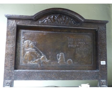 A COPPER REPOUSSE DECORATED ARTS AND CRAFTS FIRESCREEN.