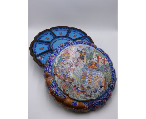A CANTONESE ENAMEL BOX, THE FITTED INTERIOR WITHIN A CUSHION FORM CASE, FIGURAL DECORATION TO TOP, FRAMED BY FLORAL PANELS.  