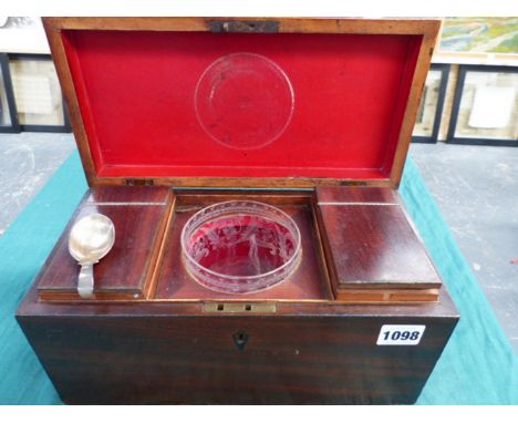 AN EARLY 19TH.C.MAHOGANY TEA CADDY WITH FITTED INTERIOR, GLASS MIXING BOWL AND A HALLMARKED SILVER CADDY SPOON.