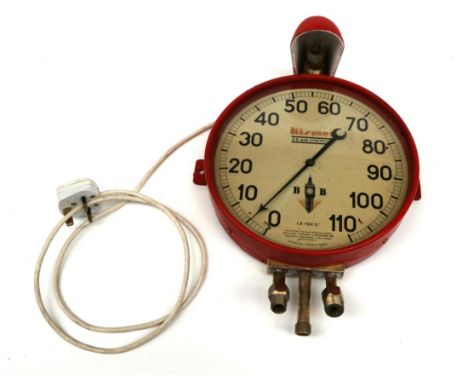 A Kismet B.B Air Control, painted red and fitted for electricity, with a metal shade enclosing a pygmy lamp, dial with black 