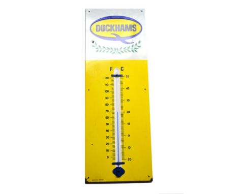 A Duckhams Single-Sided Enamel Advertising Sign, painted yellow, with a mercury thermometer for Fahrenheit and Celsius, with 