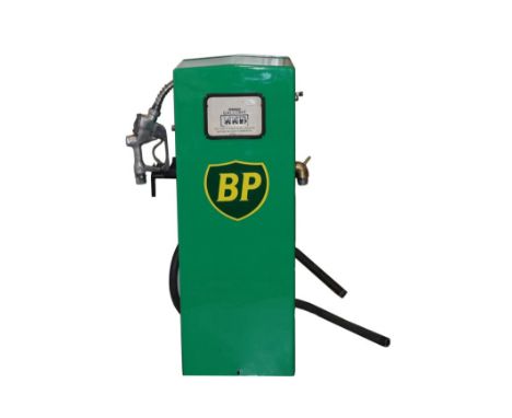 A BP Petrol Pump, repainted green with BP shield emblem, the dial with rotating numbers and three digits to count gallons, ma