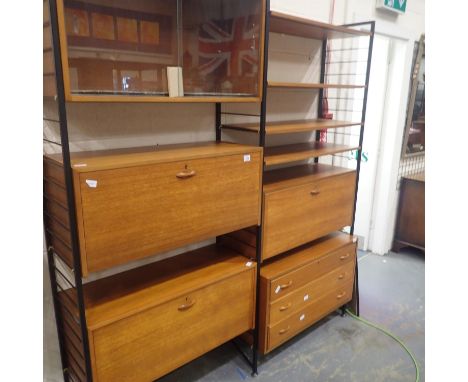 Ladderax made by Staples of Cricklewood, London, two double bays with three supporting floor-standing black racks, brass shel