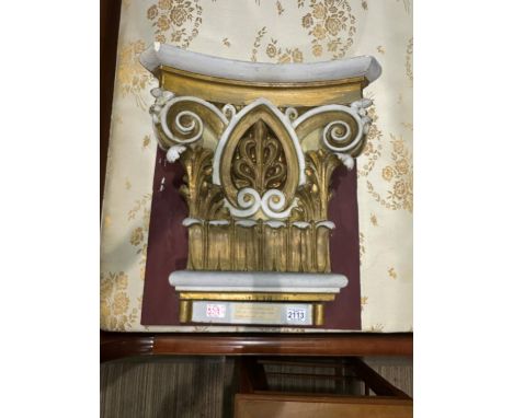 A plaster capital from the procession arch of St Marys Sunday school Houghton ground, 1906-1971, mounted on board, some losse