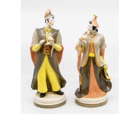 A pair of Royal Worcester figures, of a Chinese lady and gentleman.Condition: No obvious signs of damage or restoration. Scra