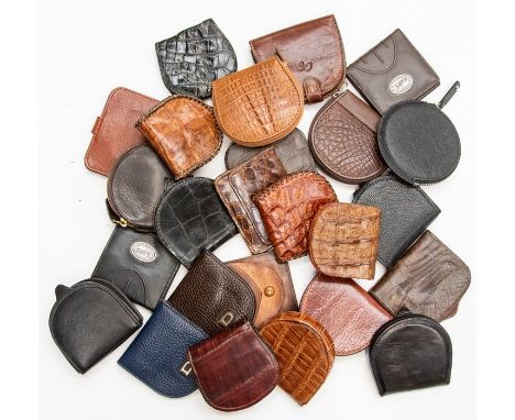 Twenty-five various recent and vintage leather and crocodile gentleman's coin holders. (25)Condition: some unused, others sho