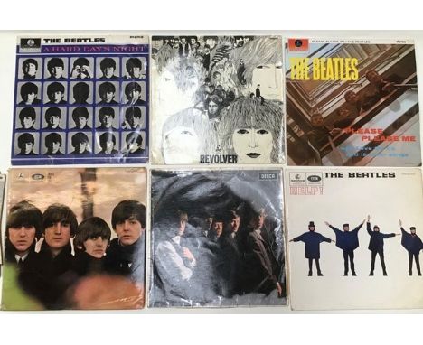 A collection of Beatles albums comprising; Please Please Me", A Hard Days Night", "Help", The Beatles Revolver, The Beatles F