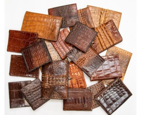 Twenty-one various recent and vintage gentleman's crocodile wallets. (21) Condition: varying signs of age and use.