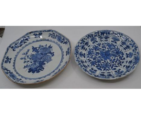Two Chinese blue and white dishes, 18th Century, the first of octagonal shape and decorated with peonies and lotus flowers in
