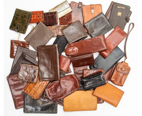A collection of recent and vintage leather and crocodile Gentleman's accessories, including spectacle cases and key wallets, 