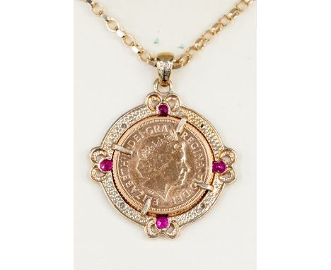 A Royal mint half Sovereign pendant, the 'Aphrodite' half Sovereign dated 2008 within a 9ct gold decorative border of grain s