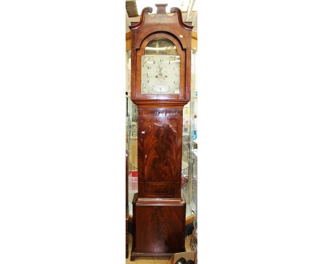 An early 19th Century eight day longcase clock, Thomas Wrotchley of Newcastle, Arabic numerals, hand painted, arched dial, se