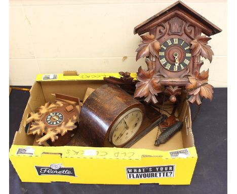 A 1950's Black Forest style cuckoo clock, a 1940's mantle clock and another cuckoo clock (3)